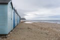 Blue beach holiday house English Channel on Jurassic coast Charmouth, Dorset, UK Royalty Free Stock Photo