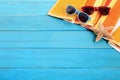 Blue beach wood deck background, sunglasses, copy space Royalty Free Stock Photo
