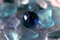 blue bead on the glass Royalty Free Stock Photo