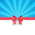 Blue beam background with cute red gift bow and