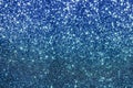 Blue beautiful festive silver shiny background of bright sparks Royalty Free Stock Photo