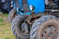 blue belarussian tractors, wheels and opened diesel engine compartment view Royalty Free Stock Photo