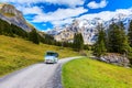 Blue bench near Oeschinnensee lake, Switzerland