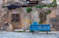 Blue bench in old alley