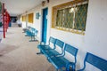 Blue bench in school yard Royalty Free Stock Photo