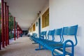Blue bench in school yard Royalty Free Stock Photo