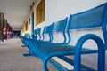 Blue bench in school yard Royalty Free Stock Photo