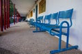 Blue bench in school yard Royalty Free Stock Photo