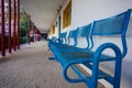 Blue bench in school yard Royalty Free Stock Photo