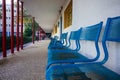 Blue bench in school yard Royalty Free Stock Photo