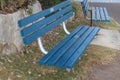 Blue benches next to each other Royalty Free Stock Photo