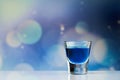 Blue color beverage inside the small shot Royalty Free Stock Photo