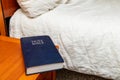 Bible on nightstand in hotel room