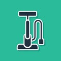 Blue Bicycle air pump icon isolated on green background. Vector Royalty Free Stock Photo