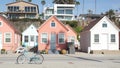 Bicycle cruiser bike by ocean beach, California coast USA. Summertime cycle, cottages and palm tree. Royalty Free Stock Photo