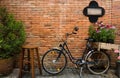 Blue bicycle with wooden box of flowers Royalty Free Stock Photo