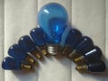 Blue big and small light bulbs Royalty Free Stock Photo