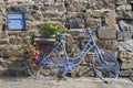 Blue bike in front of house in France