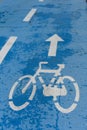 blue bike lane painted arrow cycle cycling Royalty Free Stock Photo