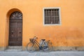 Blue Bike on Orange Wall Royalty Free Stock Photo