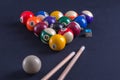 Blue billiard table with balls and cue. Royalty Free Stock Photo