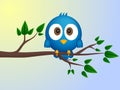 Blue bird sitting on twig