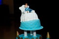 Blue birthday cake with doll character