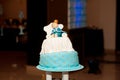 Blue birthday cake with doll character