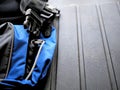Blue and black back pack strap for camping, hiking, and backpacking.