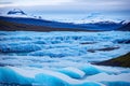 Blue and black Iceber are found at the Vatnajokull Glacier.
