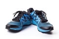 Blue and Black Running Shoes on White Background