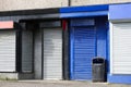 Blue and black shop business closed metal roller shutters Royalty Free Stock Photo