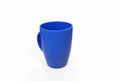 Blue blank enamel mug on bright floor. 3d rendering Royalty Free Stock Photo