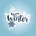 Blue blurred vector background with small bokeh lights and Hello Winter typographic text label with snowflakes for greeting card Royalty Free Stock Photo