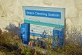 Beach cleaning station with instructions and equipment at Kinghorn, fife, Scotland, uk