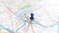 A blue board pin stuck in Verona on a map of Italy Royalty Free Stock Photo