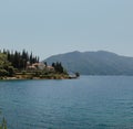 Blue boat in Bay of Kotor of Adriatic Sea, Montenegro. Beautiful view of the natural landscape. shore of Kotor. Scenic Royalty Free Stock Photo