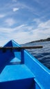 Blue boat, blue sea. Blue sky  and island Royalty Free Stock Photo