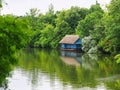 Blue Boat House on Calm Lake, Bucharest, Romania