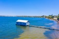 Blue boat house in Perth, Australia Royalty Free Stock Photo