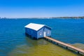 Blue boat house in Perth, Australia Royalty Free Stock Photo