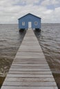 Blue boat house on river Royalty Free Stock Photo