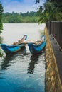 A blue boat on a lake