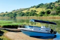 Blue boat on morning river