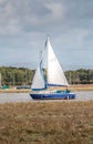 Blue boat on the River Wyre in Lancashire, UK