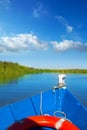 Blue boat sailing in Albufera lake of Valencia Royalty Free Stock Photo