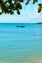 Blue Boat and Sea Vertical Royalty Free Stock Photo