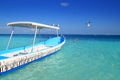 Blue boat seagulls Caribbean turquoise sea Royalty Free Stock Photo