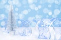 Blue bokeh background of silver christmas tree Royalty Free Stock Photo
