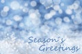 Blue Bokeh Christmas Background, Snow, Text Seasons Greetings Royalty Free Stock Photo